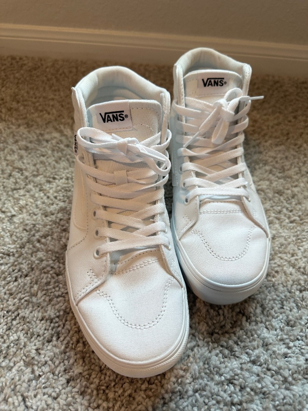 High-top white Vans